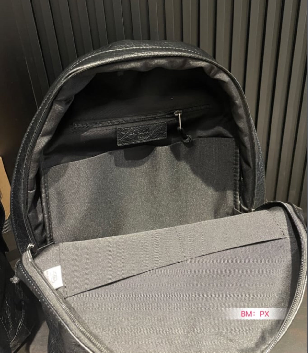 Black leather designer backpack